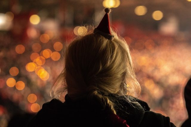 Fans of FC Union Berlin sing Christmas carols